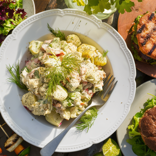 hellmann's potato salad recipe Plated served with grilled vegetables and vegan burger in outdoor setting